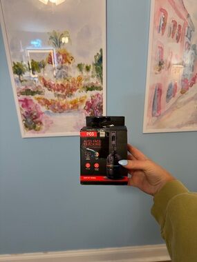 new in box AI smart tripod that automatically tracks your face and movement